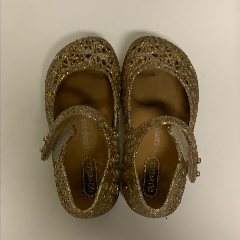 Mini Melissa gold sandals with Velcro strap